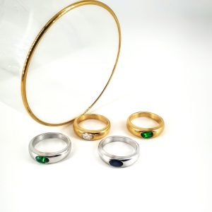 Υλικό: Ατσάλι Χρώμα: Χρυσό,Ασημί Πέτρες ζιργκόν : Άσπρο,πράσινο,μαύρο