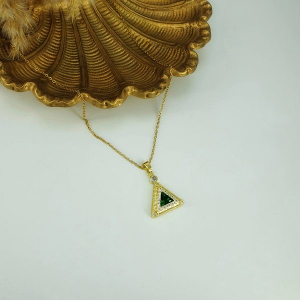 Υλικό : Ατσάλι Χρώμα : Χρυσό Πέτρες Ζιργκόν : Διάφανες + πράσινο Διαστάσεις : 40 cm + 5 cm 